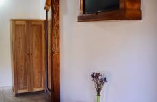 Szoba kertre néző kilátással